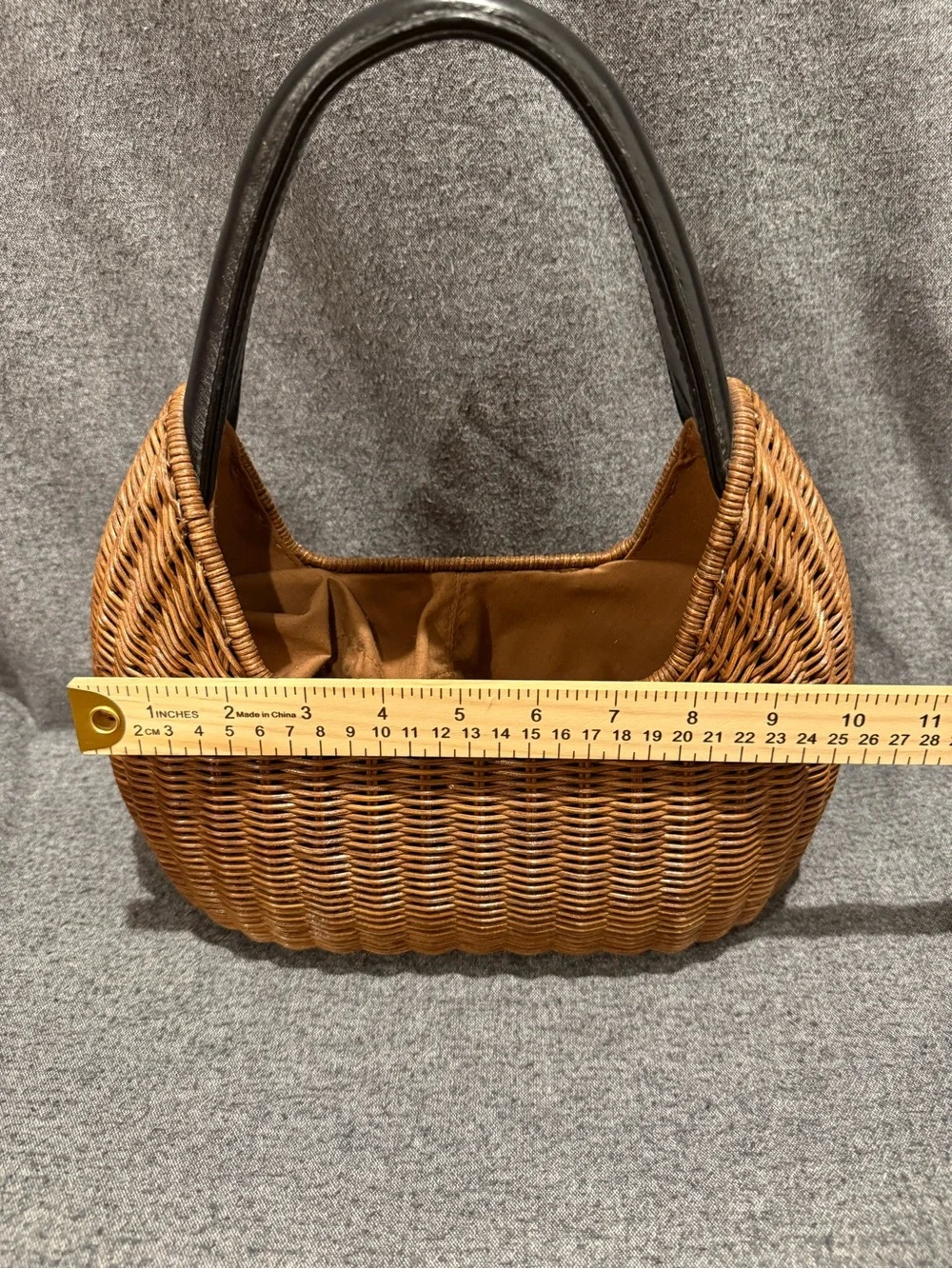 Woven Brown Rattan Basket Handbag w/Black Handles Pre-owned. Good condition